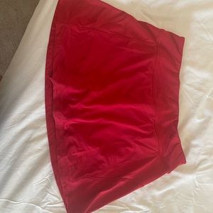 Size medium red Fila tennis skirt.